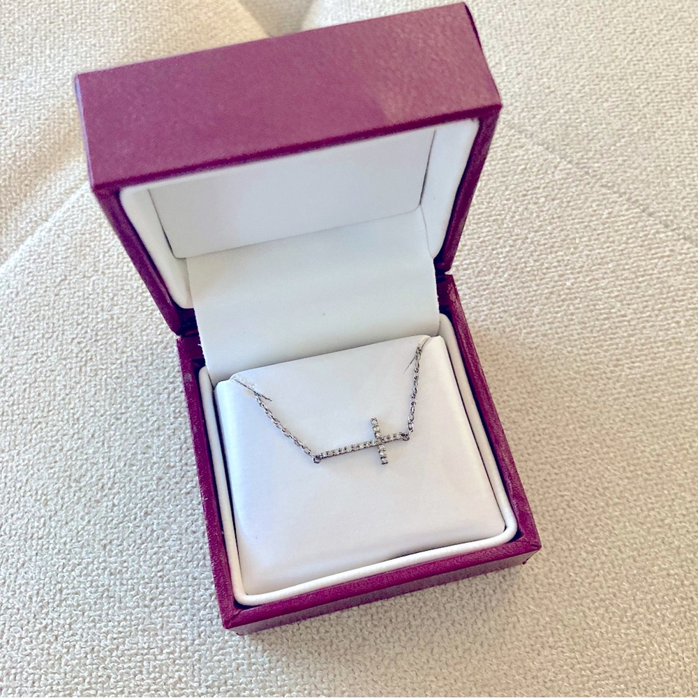 Infinity X Infinity™ 1/10 ct. tw. Diamond Sideways Cross Necklace in 10K Gold